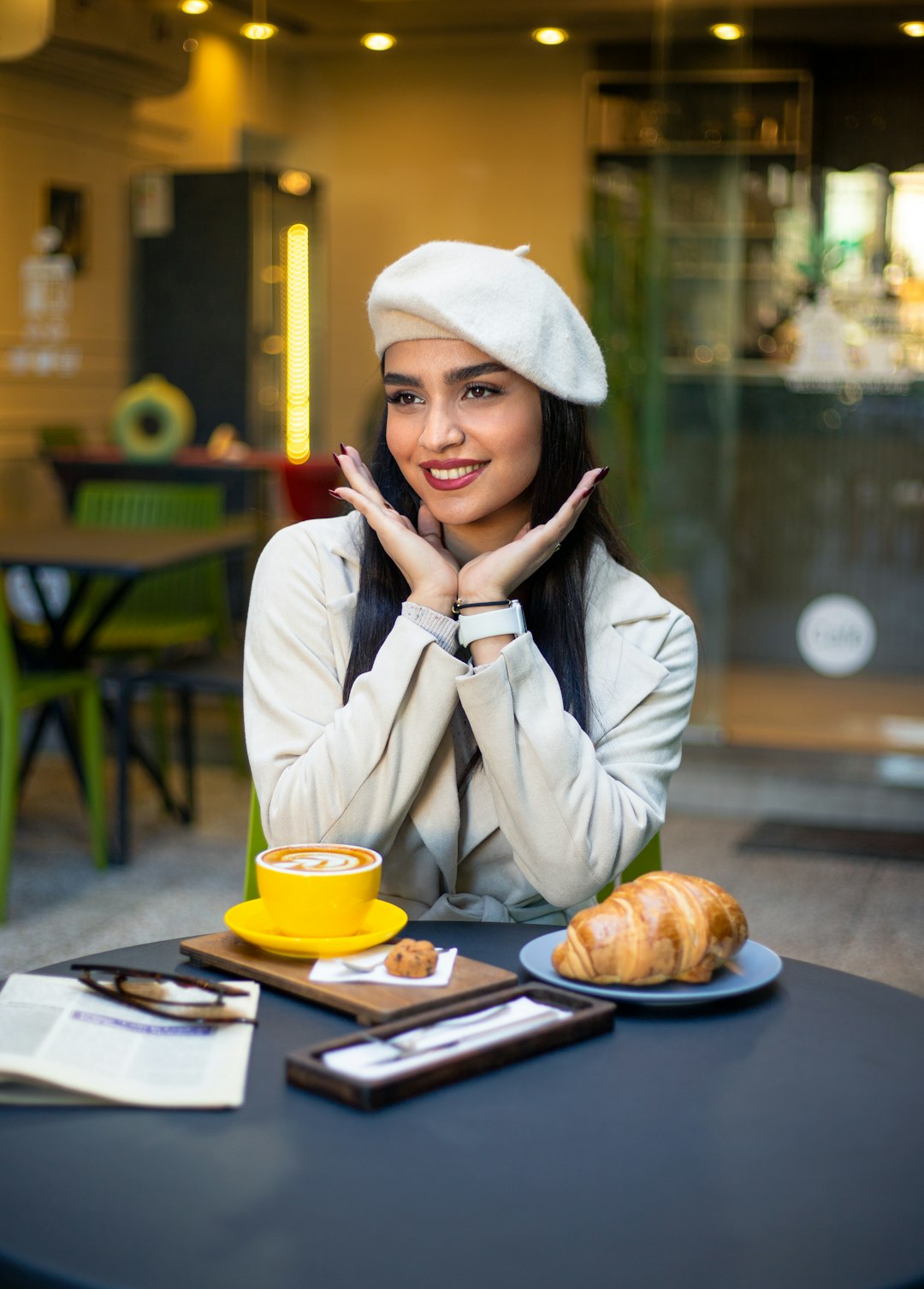unsplash woman enjoying a coffee in a cafe with a smile aacaxi dn8c