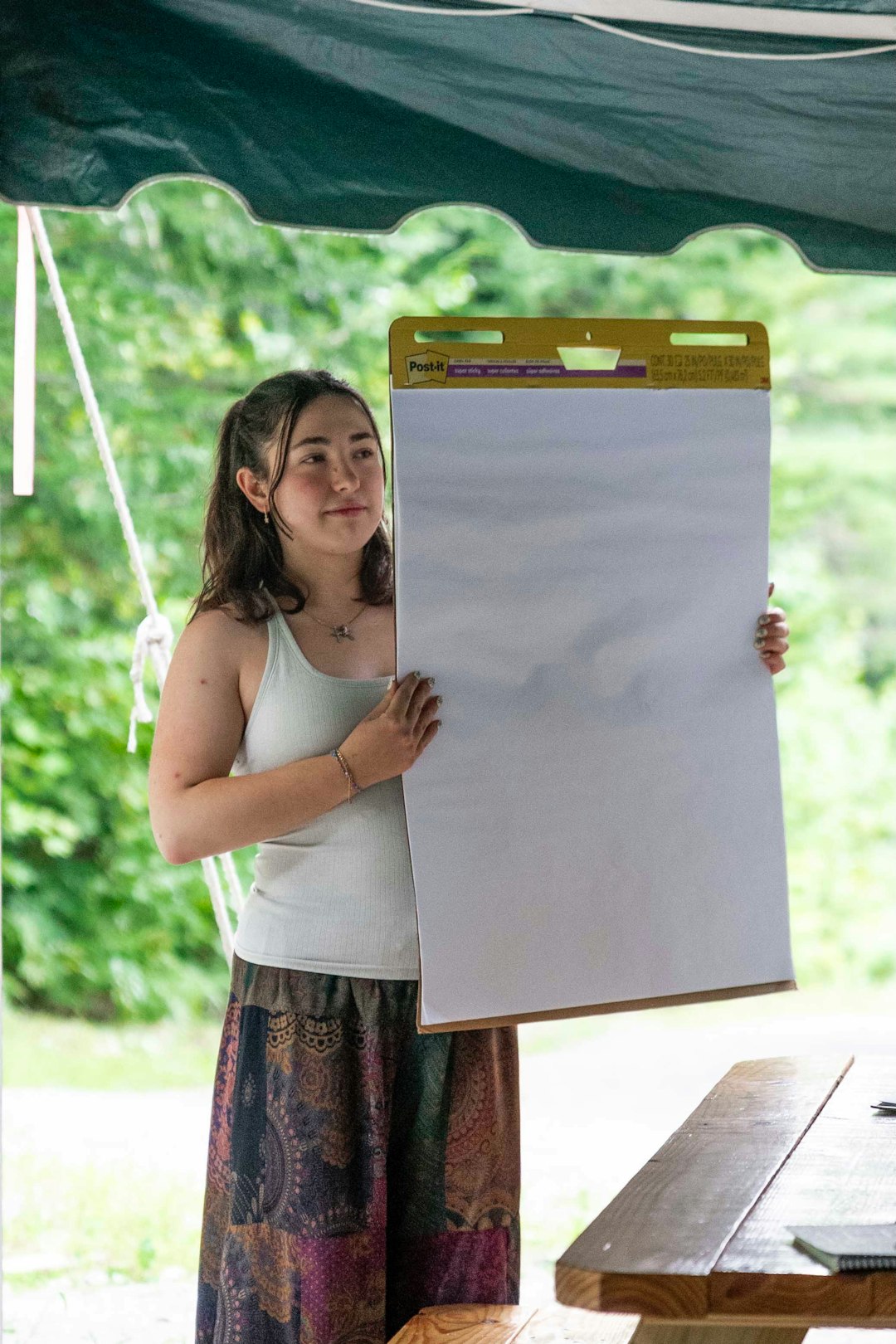 unsplash a person looking at a vision board with images and words representing their goals and aspirations wpvu5pseczg