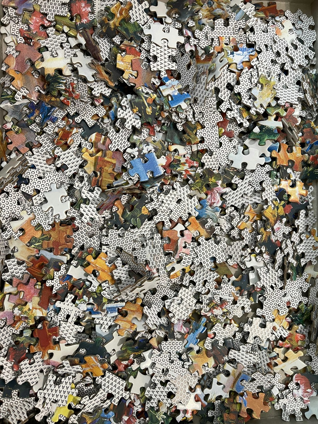 unsplash person looking at a large puzzle with many pieces coming together cfwk4pzs8e