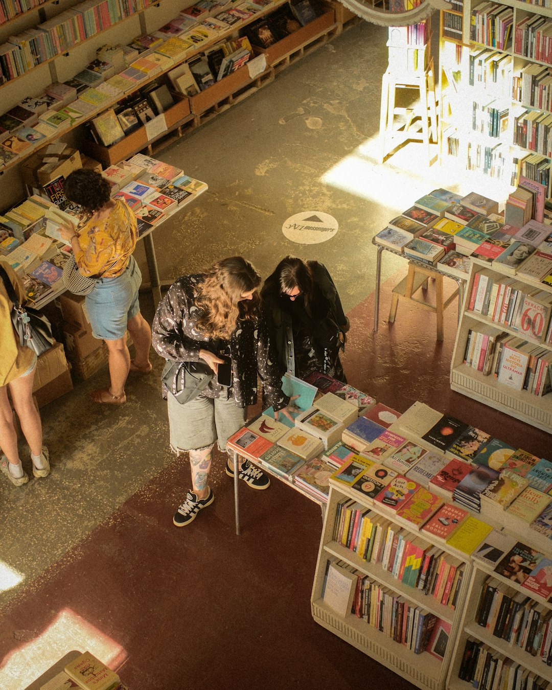 unsplash person reading a book in a cozy library rdrdwrlnyn8